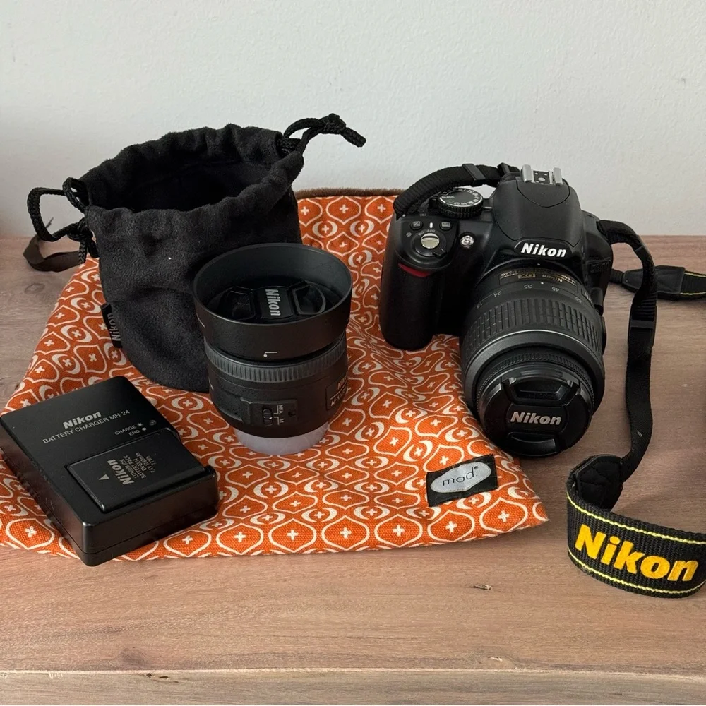 Nikon D3100 with two lenses and carry case. EUC